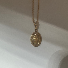 Miraculous coin necklace