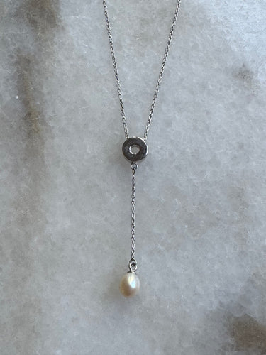 Rhea circle and drop chain with pearl necklace.