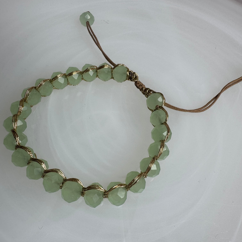 Peridot quartz with gold and taupe string.