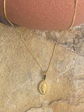 Miraculous coin necklace