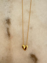 The golden hammered heart necklace