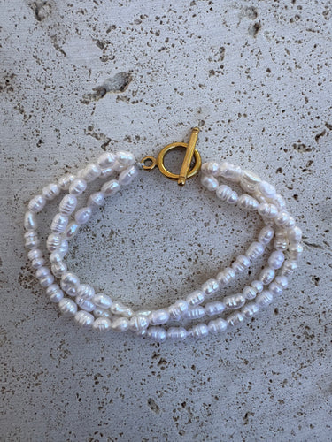 Triple layered rice pearl bracelet