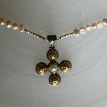 The gold filigree Byzantine fresh water pearl cross