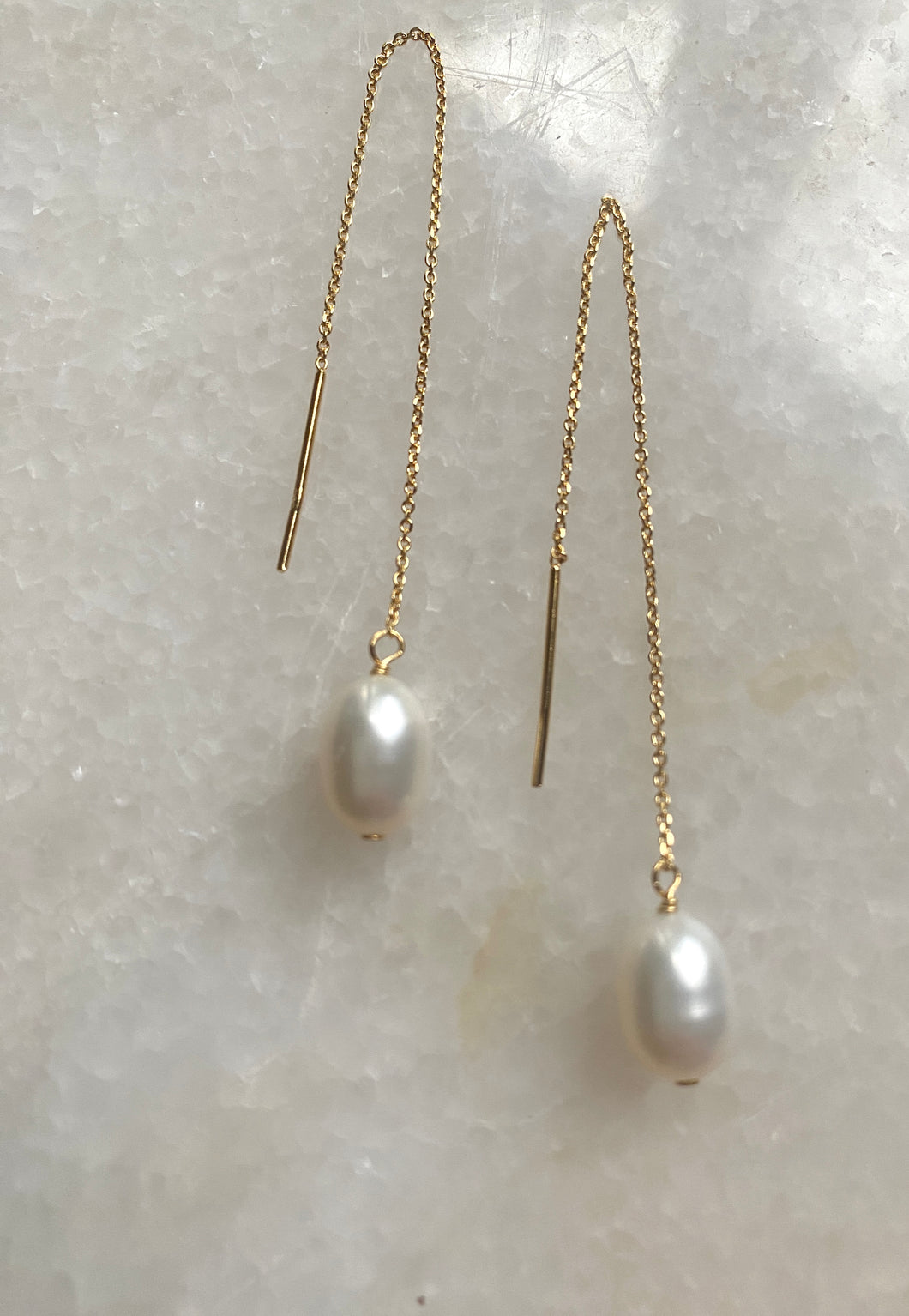 Gold pearl thread through earrings