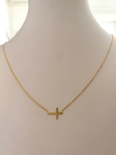 9k resting gold cross necklace