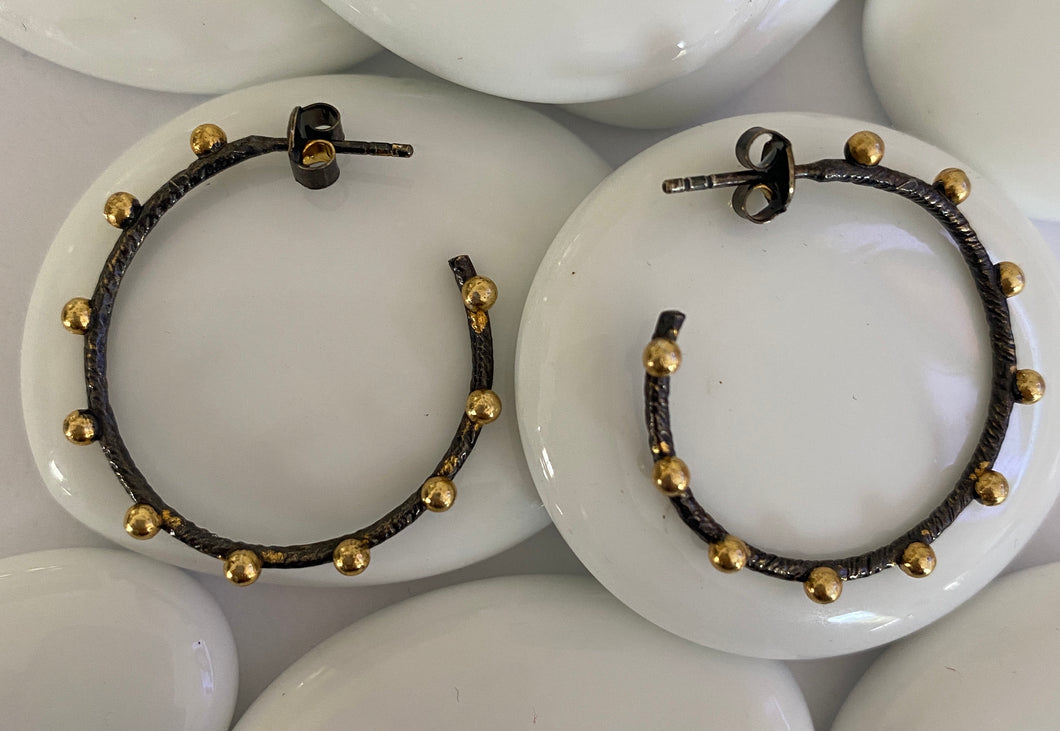 ‘Anna’ black oxidised hoop studs with yellow gold beads.