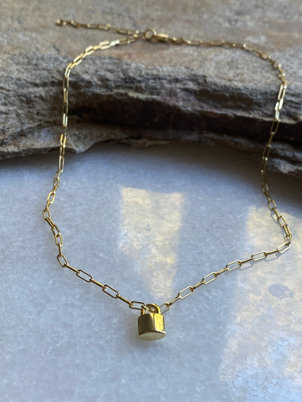 Lock on a chain necklace