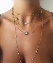 A Layered Gold mati necklace combination