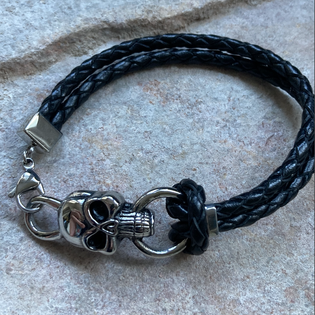 Skull and black leather bracelet