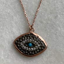 Turquoise mati-eye oxidised in Yellow, Rose and Silver.