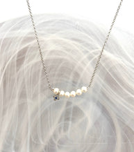 6 Pearls with petite cross necklace