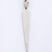 A shiny spike necklace with cubic zirconia, displayed on a plain background.