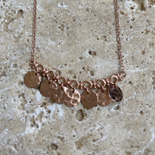 Rose jingle necklace