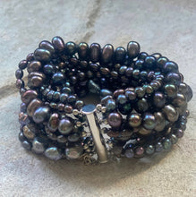 Multi strand black fresh water pearl bracelet