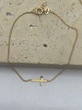 9k Gold resting Cross necklace