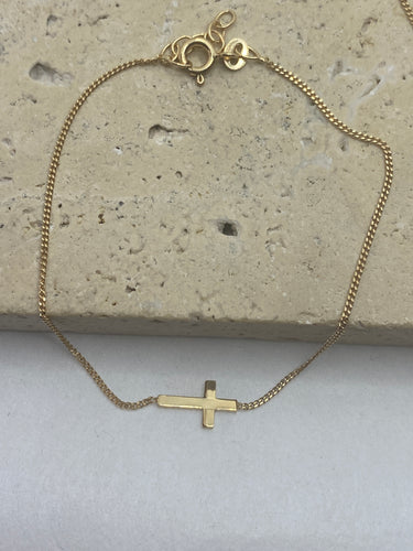 9k Gold resting Cross necklace