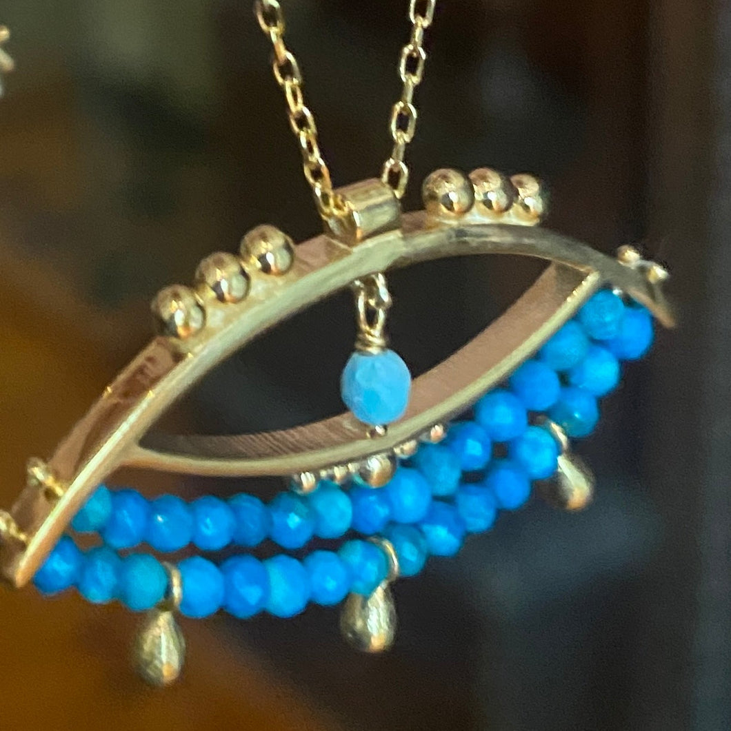 The ‘blue beaded eye’ necklace.