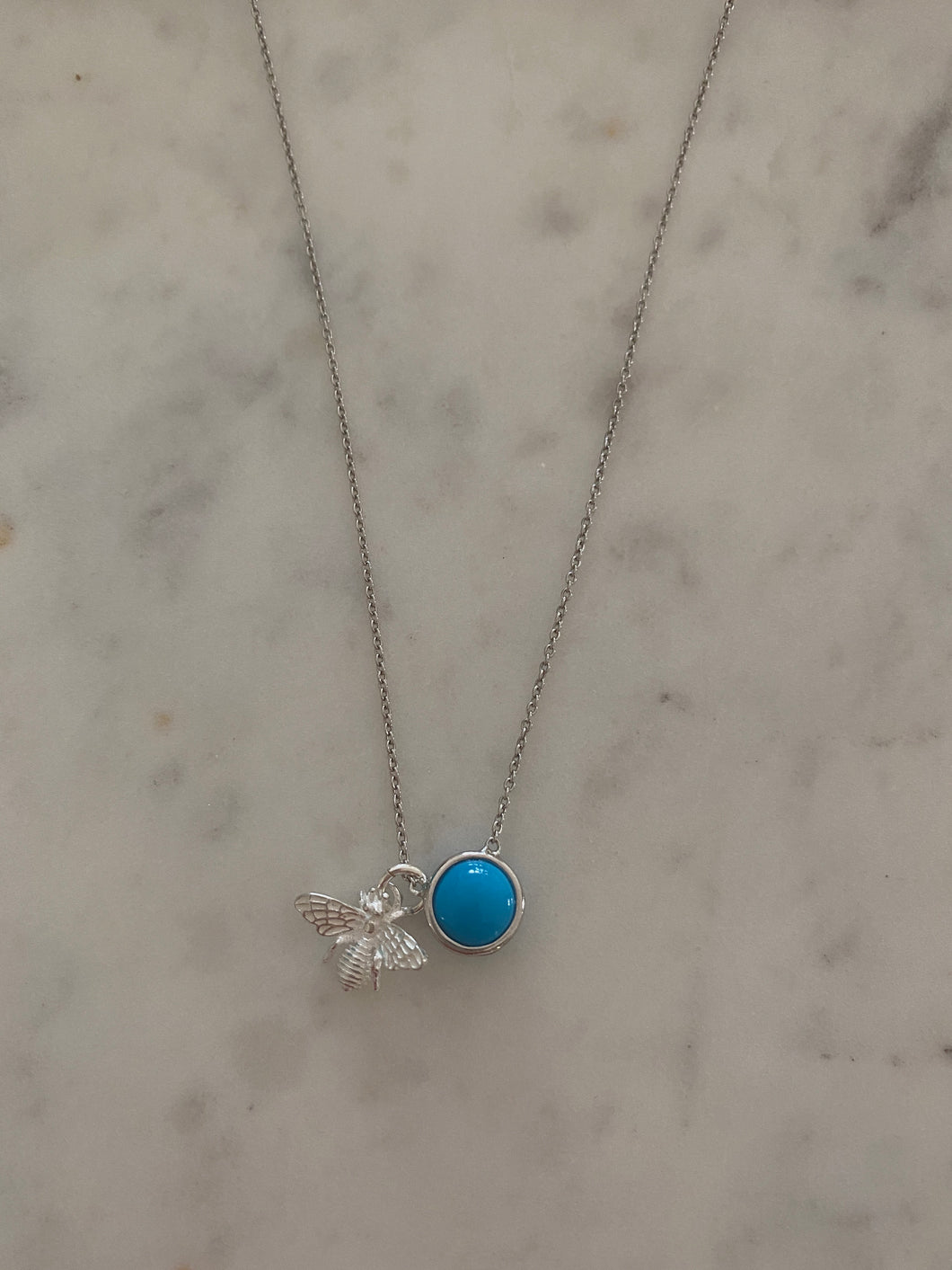 Turquoise cabochon with silver Melissa bee