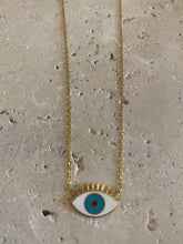 ‘Long lashes gold’ eye necklace