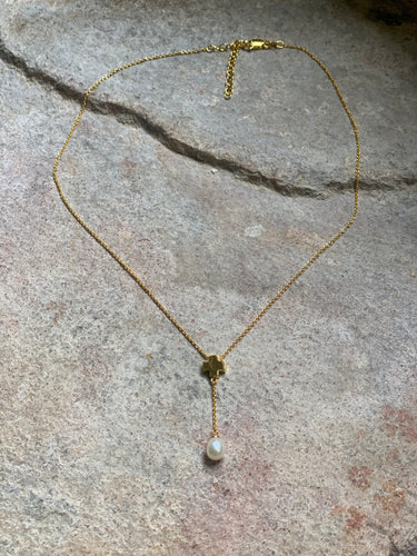 Rhea block cross and pearl